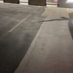 Before and after parking garage power washing.