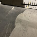 Before and after parking garage power washing.